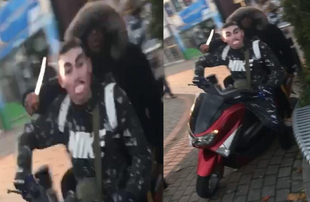 Two men caught on camera riding around Arnold town centre wielding knife
