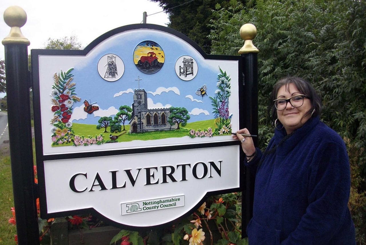 Calverton artist with village sign