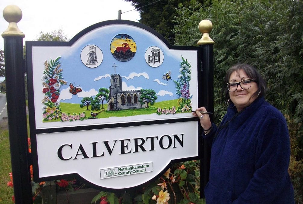 Calverton artist with village sign