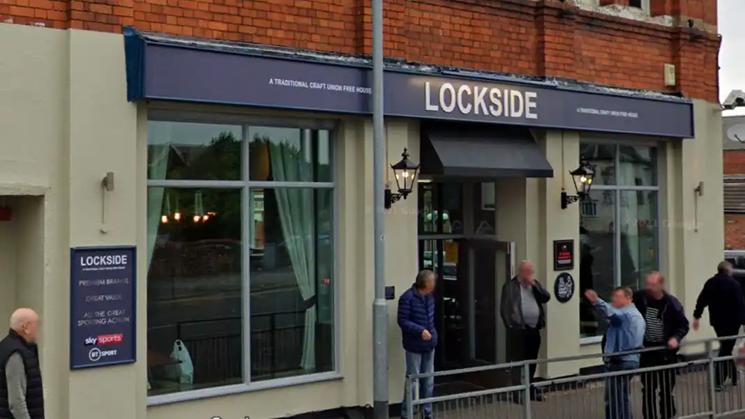 Man arrested after car stolen from Woodthorpe smashes into pub