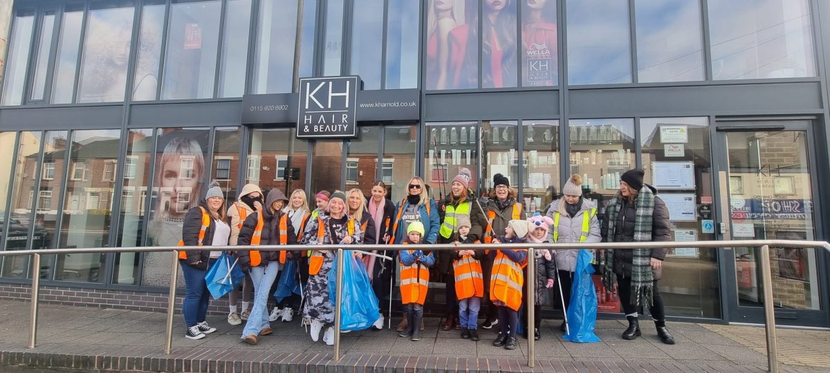 Staff from KH Hair Arnold brave the cold in a bid to clean up the town’s streets.
